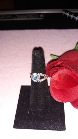 Blue Topaz and Garnet ladies ring