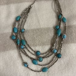 Chico's multi-strand statement necklace featuring silver-tone beads and turquoise stones