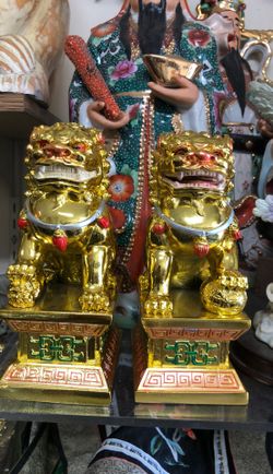 A pair of Chinese golden temple dog or Fu dog 2 pieces in a set