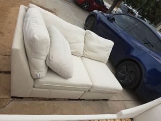 Freee.  Cream Fabric Armless Modular Sofa Sections