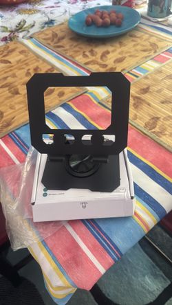 Brand new Foldable metal holder for lab top or iPad $15 each I have 12