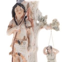 German Bisque Figurine of a Native American with Papoose Swinging From Tree
