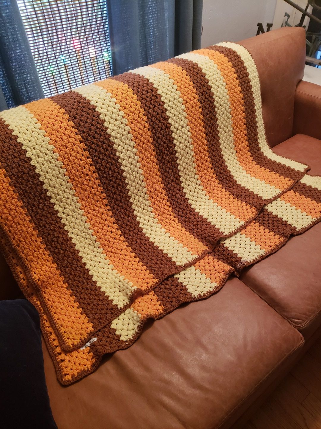Handmade afghan orange yellow brown