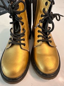 Kids gold and black Doc Martens