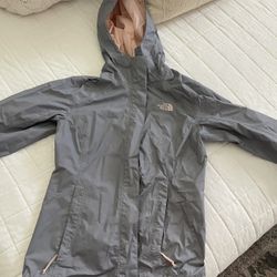 Woman’s North Face XS Gray And Pink Waterproof Windbreaker 