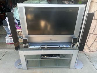 -Sony TV With Table And Surround Sound-