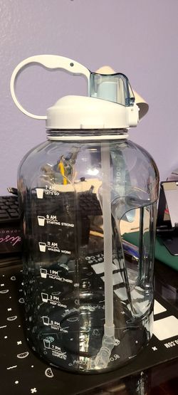 Blogilates 1 gallon blue water bottle with straw
