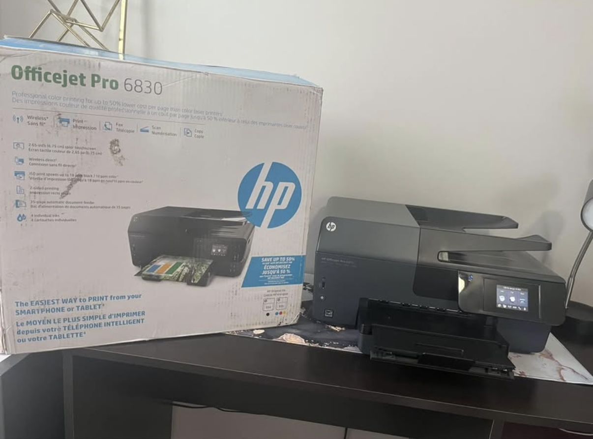 HP Officejet Pro 6830 All-in-One Printer (lots of ink is included)