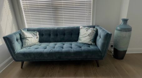Blue upholstered settee