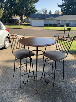Table and 2 chairs..