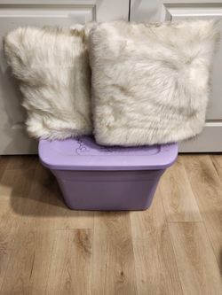 Set of sofa faux fur pillows.