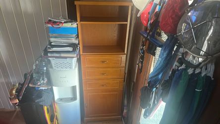 Wood shelf with 3 drawers and door