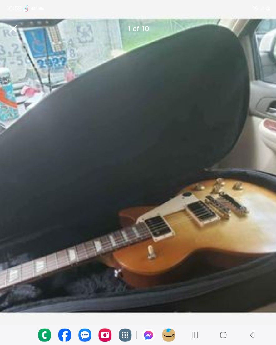 Made in usa Gibson Les Paul tribute electric Guitar Mint Condition
with gibson deluxe leather Gigbag