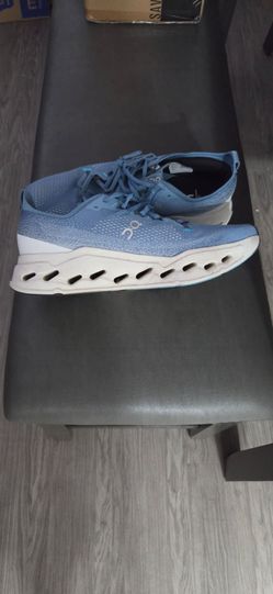 Running shoes.  Cloud tech helion