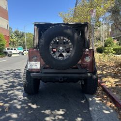 Rear Bumper with Swing Out Tire Carrier Jeep TJ