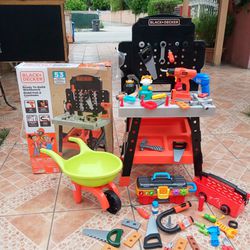 2 Kids Workbench.   1 New.... 1used Include Toys