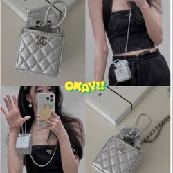 Designer Mini drawstring bucket bag on chain