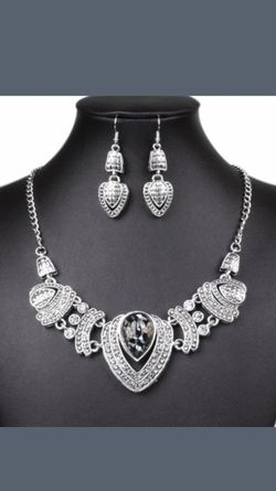 Silver necklace and earring set