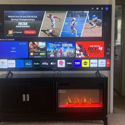 LG 75 IN SMART TV W ITH  HEATER FIRE PLACE STAND 800$