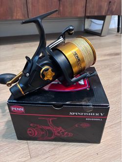 Like New! 2 Penn Spinfisher V Live Liner reels and 4 spinning rods