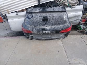 Audi Q5 hatchback back with tinted glass,spoiler.R  And L taillens and emblems + interior plastics $300
