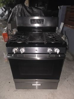 30 in. 5.0 cu. ft. Freestanding Gas Range in Stainless Steel with Griddle stove