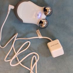 NuFACE Mini Facial Toning Device, a portable beauty tool designed for at-home facial lifting and contouring. 
Excellent condition 
Hold charges 
Teste