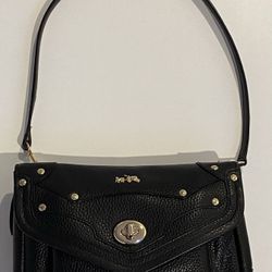 Coach Pebbled Leather Rivets Rhyder Crossbody Bag