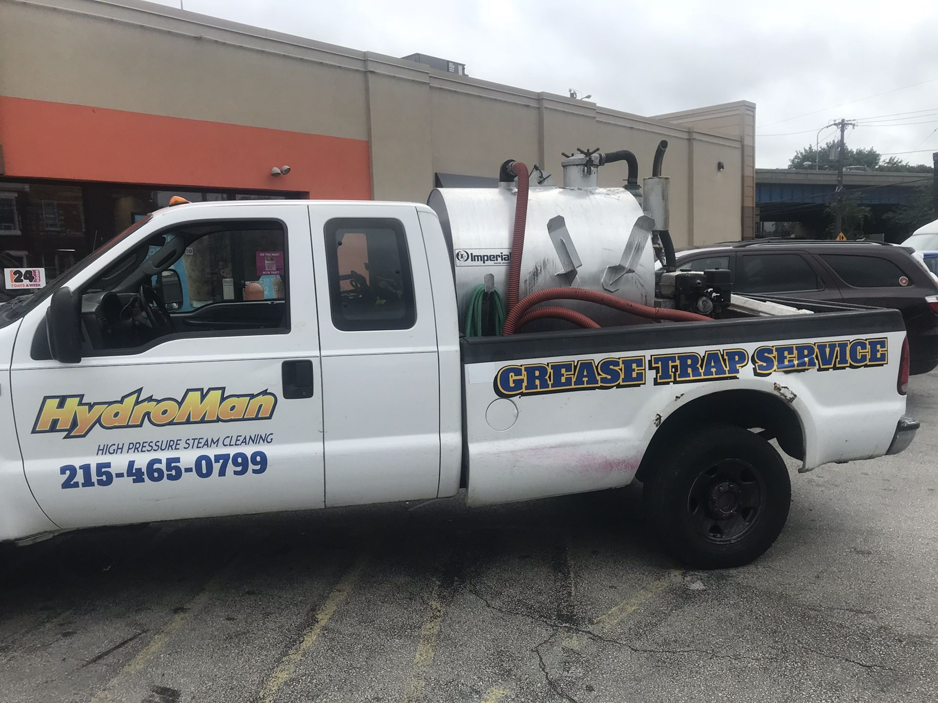 Grease trap cleaning. Porta potty truck vacuum truck