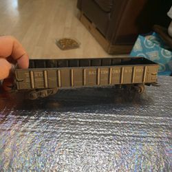 This is a vintage Marx 0 Gauge B&O 254000 tin lithographed gondola model train car. 
