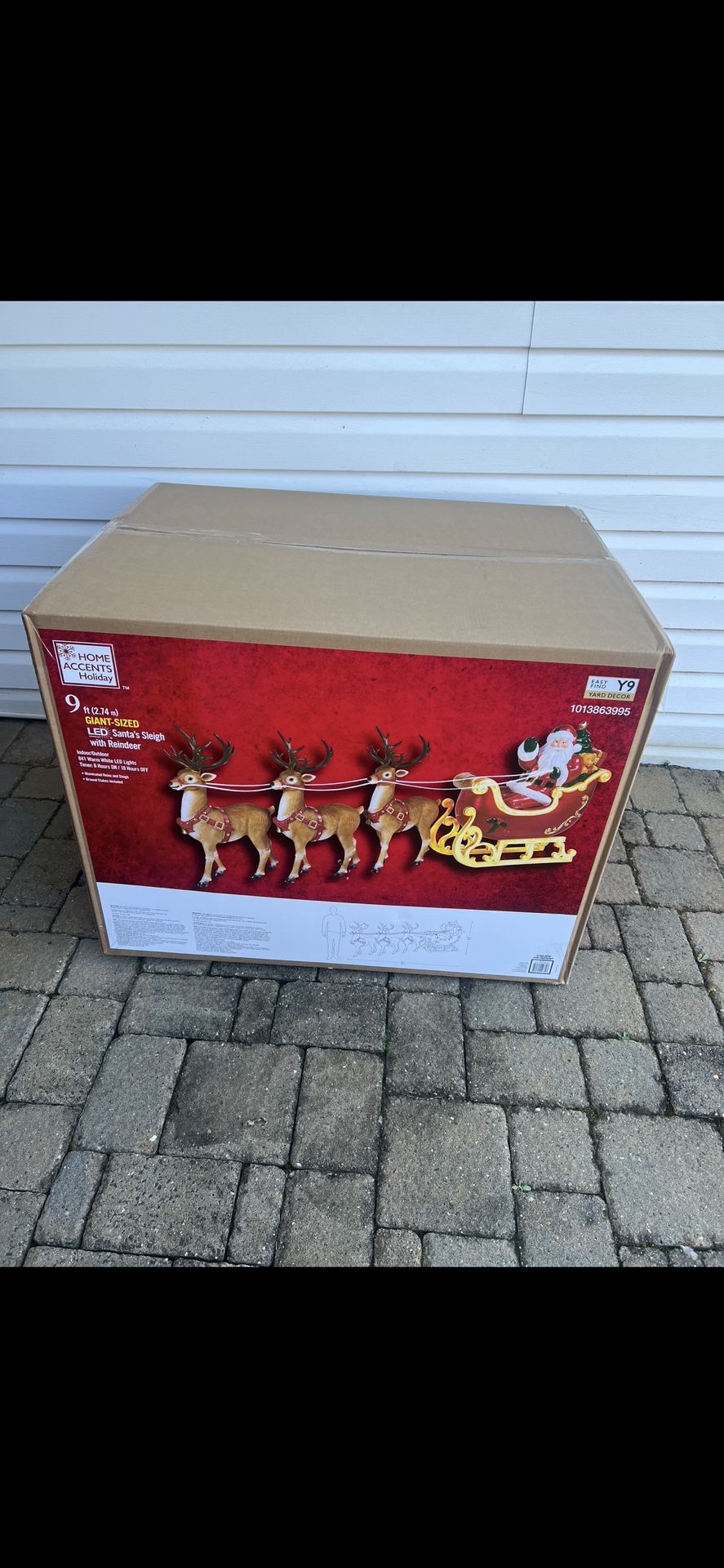 HOME DEPOT - Santa's Sleigh with Reindeer Holiday Yard Decoration - Home Accents Holiday 9 ft. Giant-Sized LED