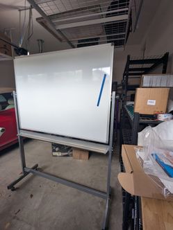 Magnetic white board on rolling stand