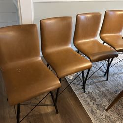 West Elm sloped Leather And Iron Dining Chairs