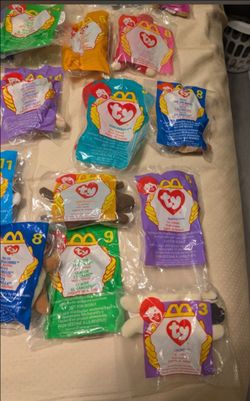 Brand new 57 beanie babies in packages ( never used ). Never open