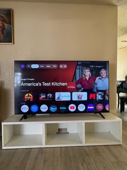 TLC TV W/ White Entertainment Center