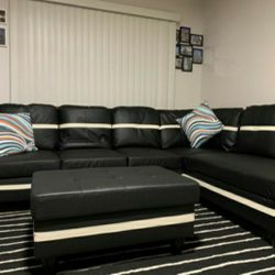 Brand New Black Leather Sectional With Storage Ottoman