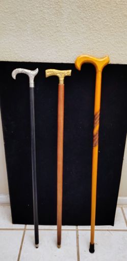 3- used walking canes