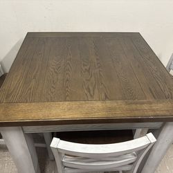 Nice high top table and 4 chairs