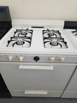 Gas stove only. Pick-up. 30-day warranty. $100.