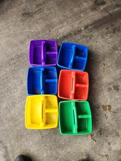 Six multicolored organizing caddies
