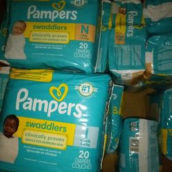 Baby Pampers There Are 12 Newborn 20on Each Packages.And 10#1 Packages 