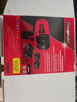 Snap on cordless impact gun 2 battery and a charger 800.00 firm