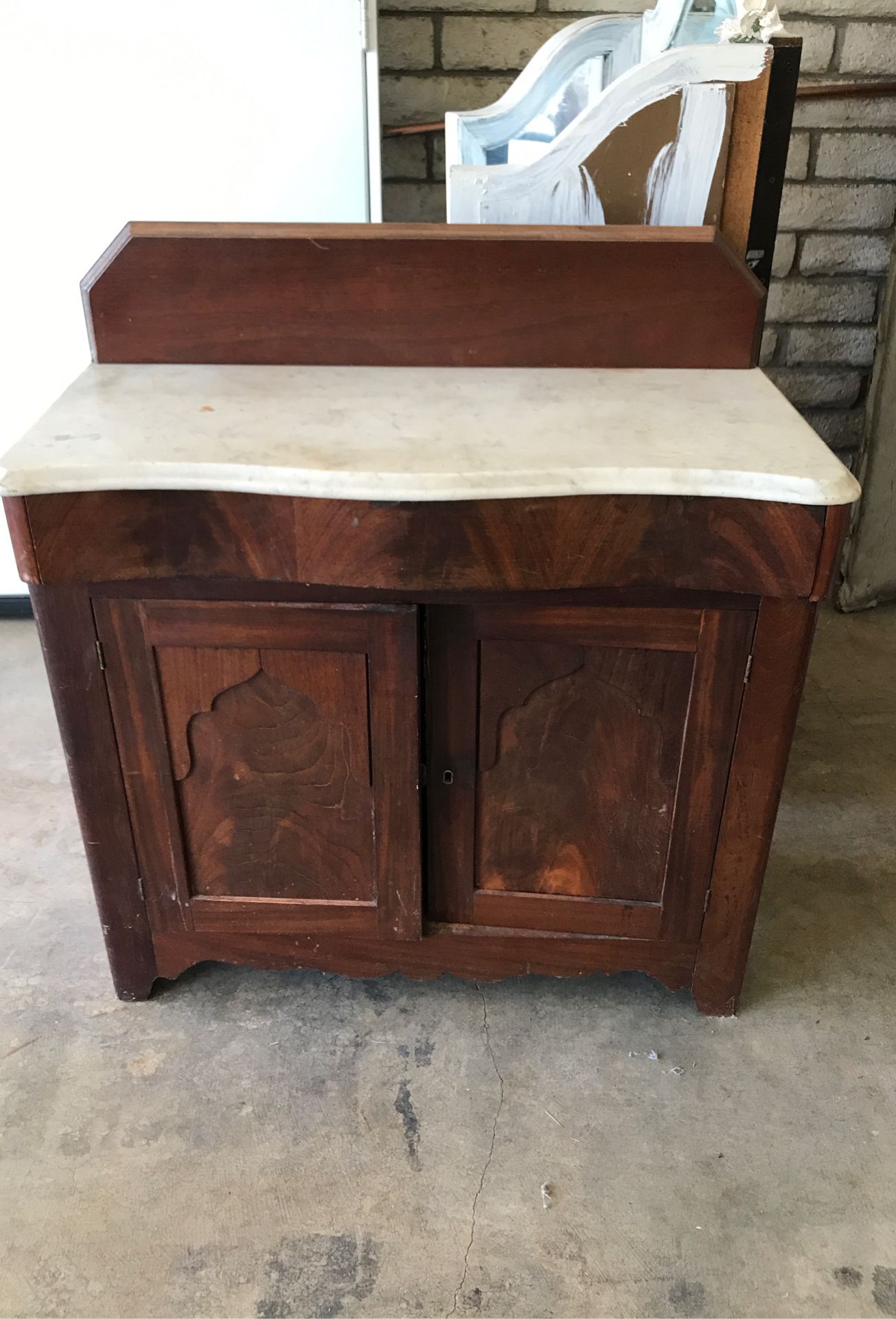 Marble top antique cabinet
