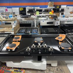 BLACK BUILT IN GE GAS COOKTOP