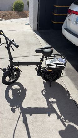Brand new electric bike goes 20 miles an hour to 25 miles an hour depending on the weight of the person falls in half kickstand lights horn asking 240