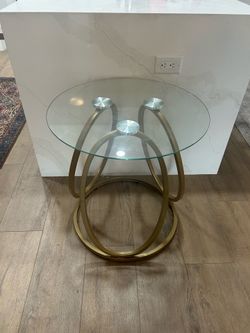 Glass Table. 25Hx24W