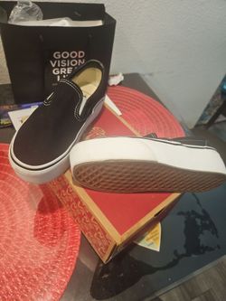 Tennis vans plataforma negros.