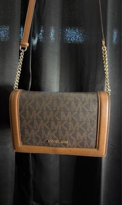 Michael Kors cross body bag $60 used but good condition