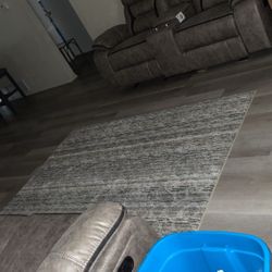 dining table and matching couch and love seat recliners 