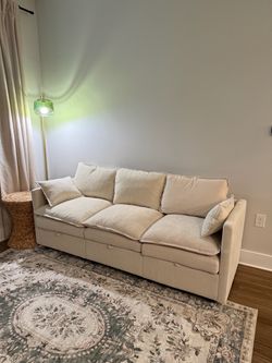 Cream couch with storage